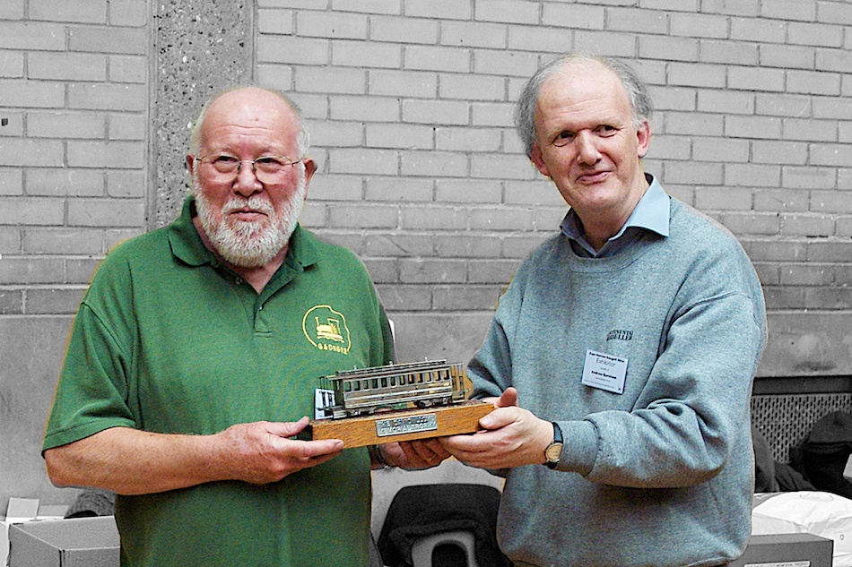 Richard Glover is presented the 2014 David Lloyd Trophy by Andrew Burnham